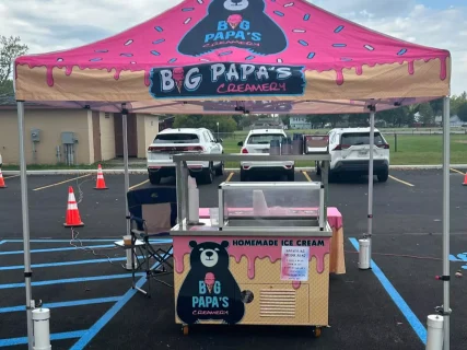 Big Papas Creamery pop-up tent and cooler.
